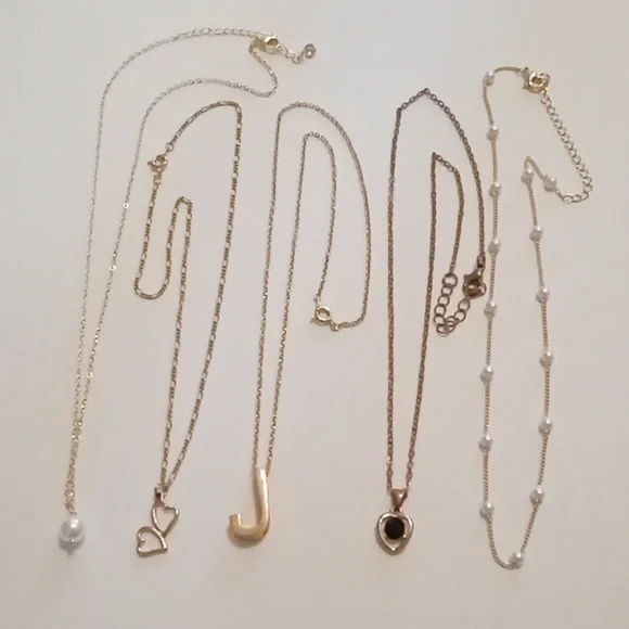 #1110. 5 Piece Assorted Gold Toned Pendant And Faux Pearl Necklace Bundle - Picture 1 of 10